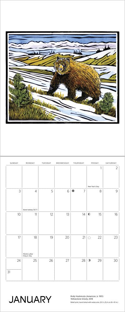 Calendar with a bear illustration on a snowy landscape