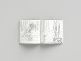 Open book with black and white line art illustrations on a gray background