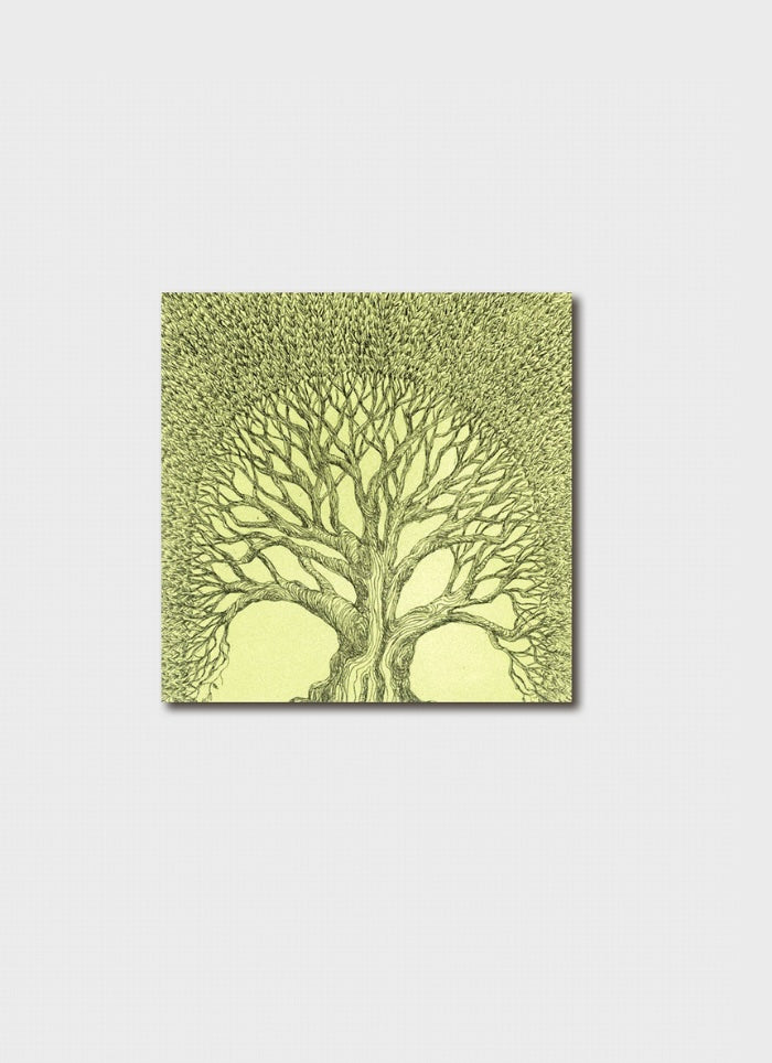 A small card with a green tree on green background