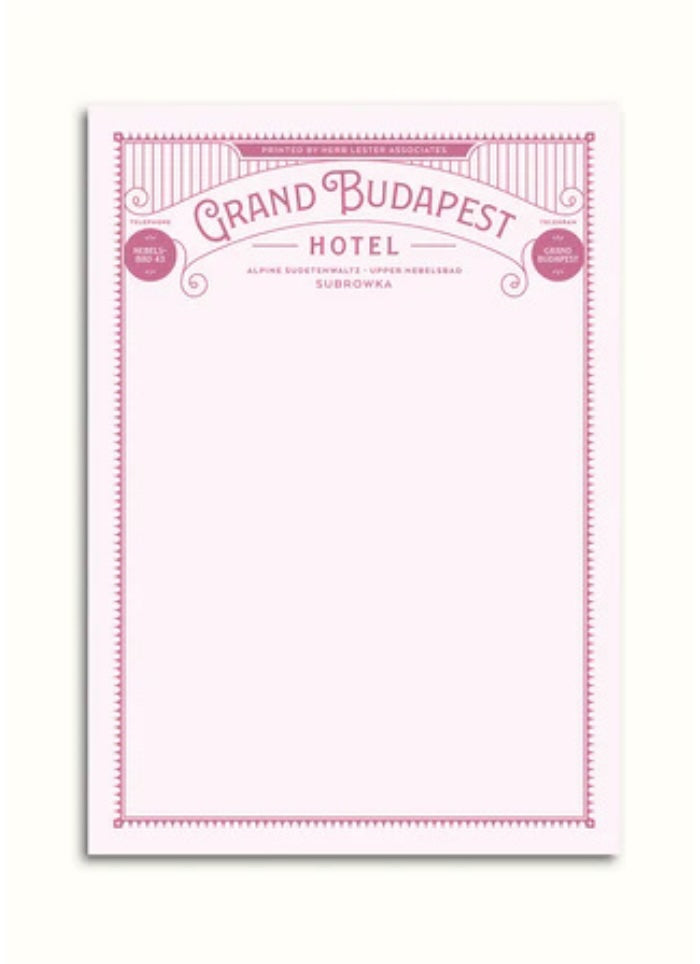 Notepad with 'Grand Budapest Hotel' branding on a white background
