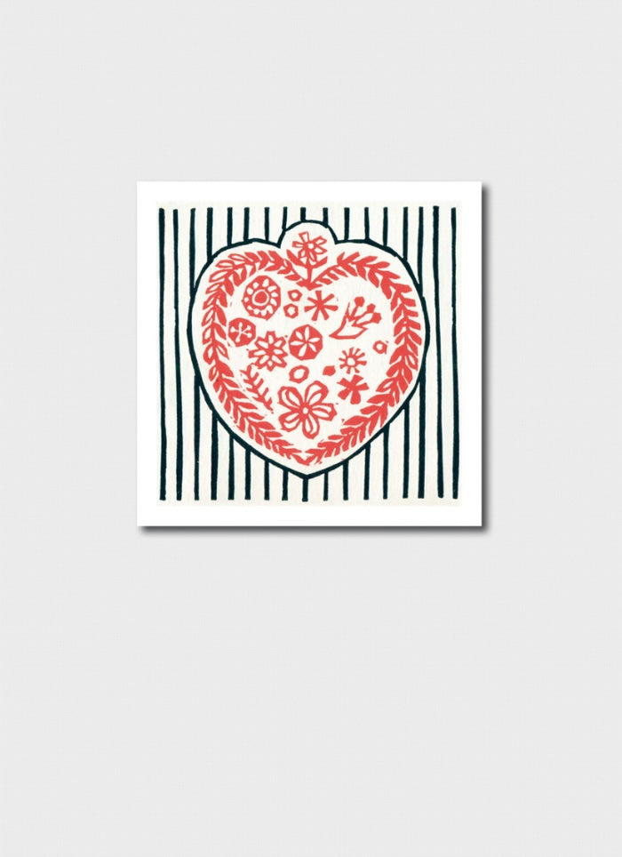 Decorative heart design with floral patterns on a striped background