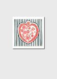 Decorative heart design with floral patterns on a striped background