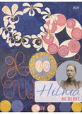 Cover of a calendar titled 'Hilda af Klint' with floral designs and a portrait on a blue background.