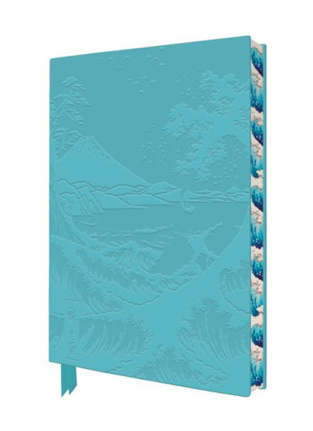 Turquoise notebook with mountain design on a white background