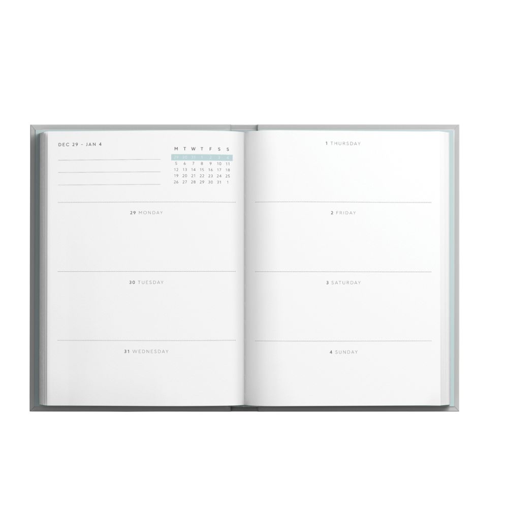 Open planner with calendar and weekly layout on a white background