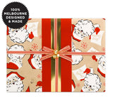 A Christmas present with santas and a red ribbon.