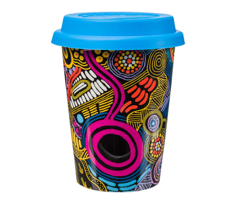Colorful travel mug with abstract design and blue lid on a white background