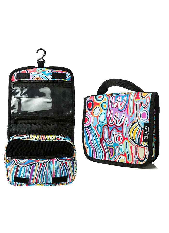 A toiletry bag with a colourful abstract pattern and black interior