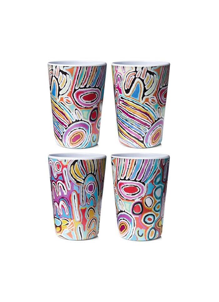 Four colorful ceramic cups with abstract patterns on a white background