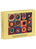 A yellow box featuring Wassily Kandinsky's abstract geometric art, with the name 'KANDINSKY' printed in black at the bottom.
