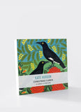 Pack of Christmas cards with bird design on a white background