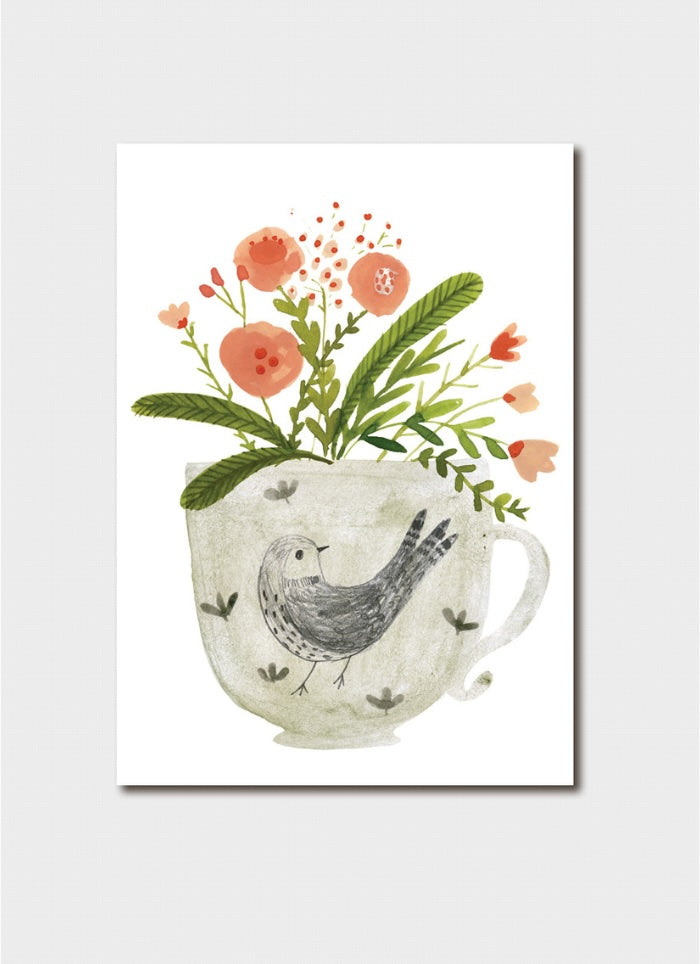 Illustration of a teacup with flowers and a bird on a white background