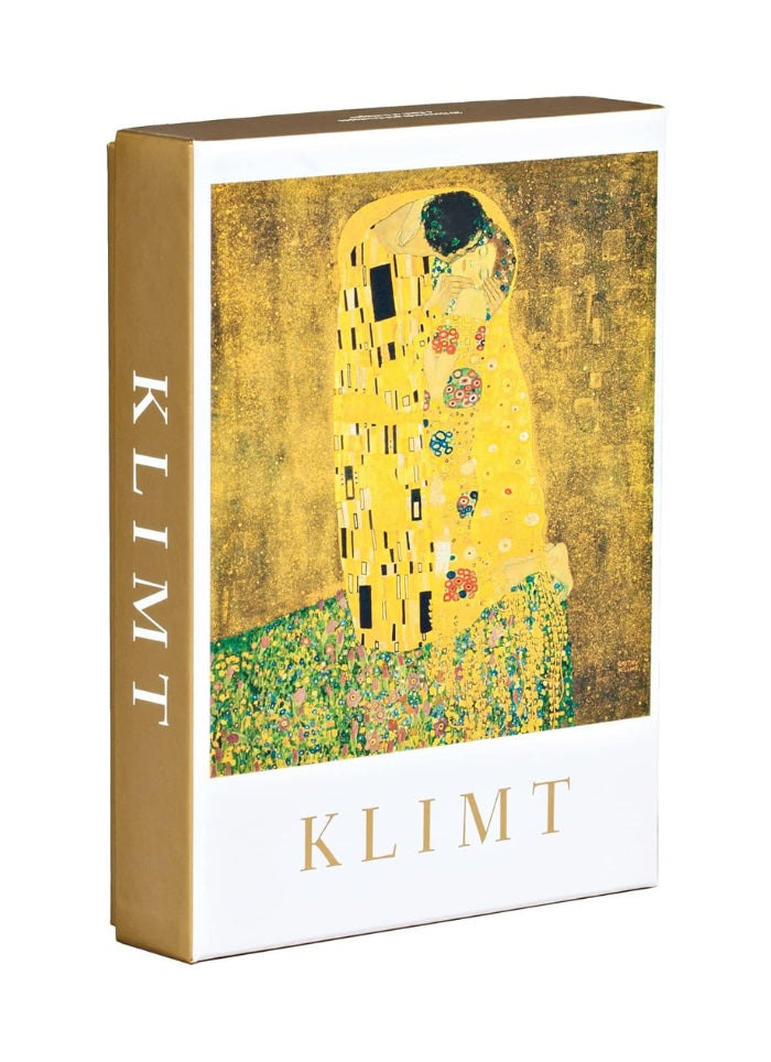 Book or box with 'Klimt' branding and a depiction of 'The Kiss' on a yellow background.