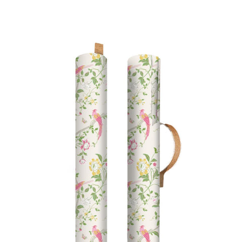 Two rolls of floral-patterned paper with wooden handles on a white background