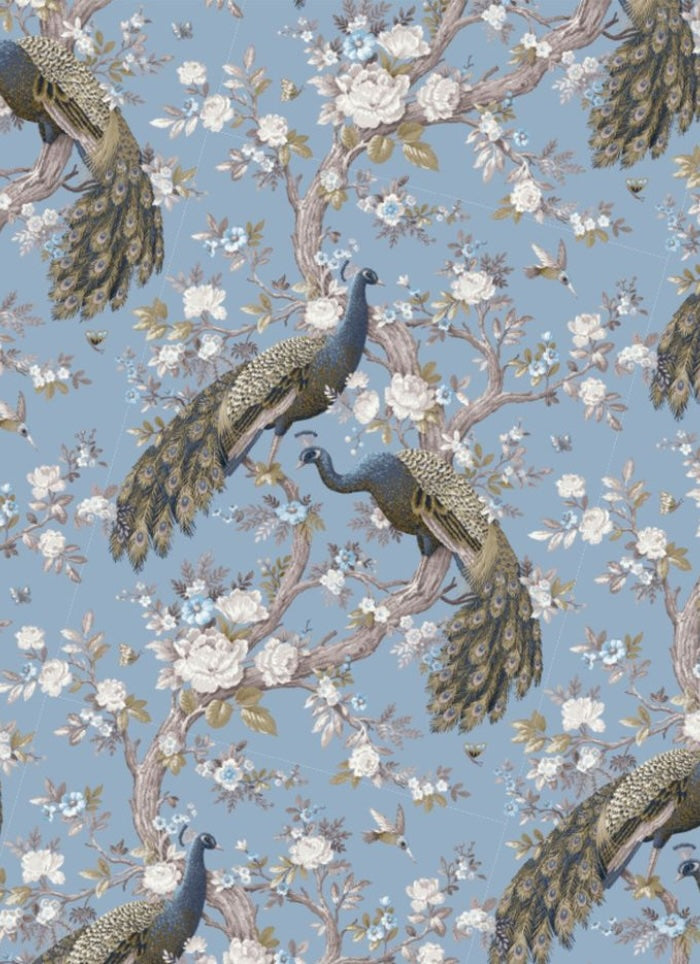 Pattern of peacocks and floral branches on a blue background