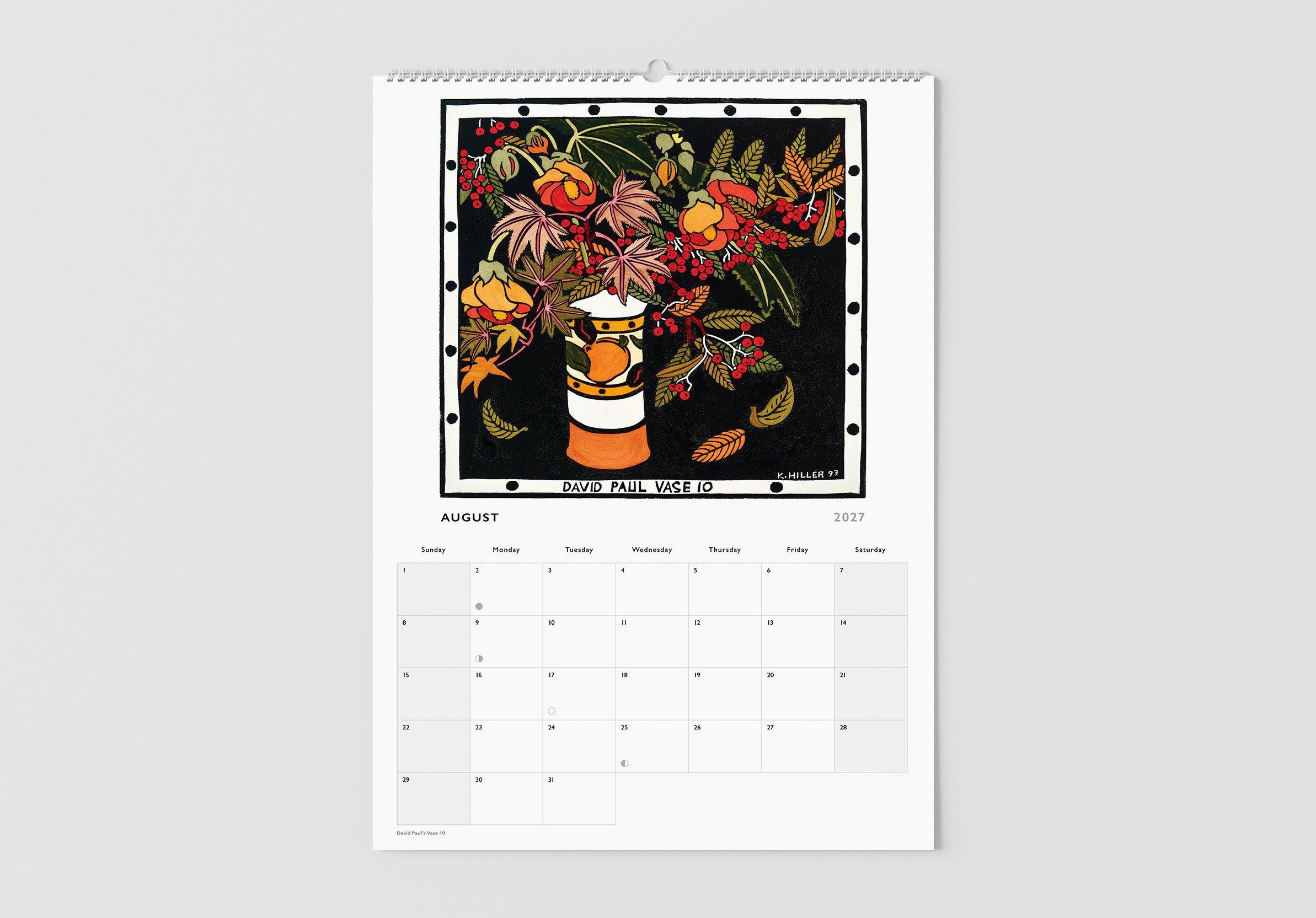 Calendar with a floral design on a white wall