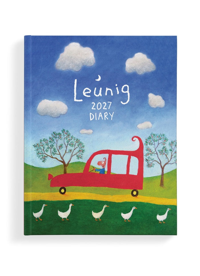 A hardcover diary with a colorful illustrated cover showing the text 'Leunig 2027 Diary'. The cover art features a blue sky with white clouds, green hills, a red car, trees, and five white geese walking along a yellow path.