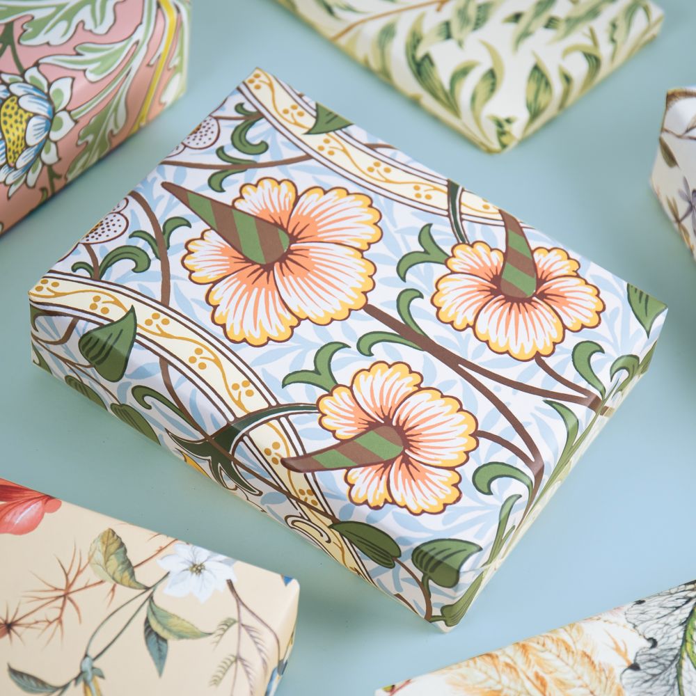 A gift wrapped in floral wrapping paper.