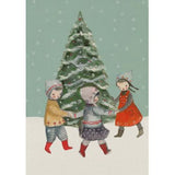 A vintage card with a Christmas tree and 3 children holding hands and dancing around it with hats on