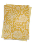 Two yellow greeting cards with floral patterns on a white background