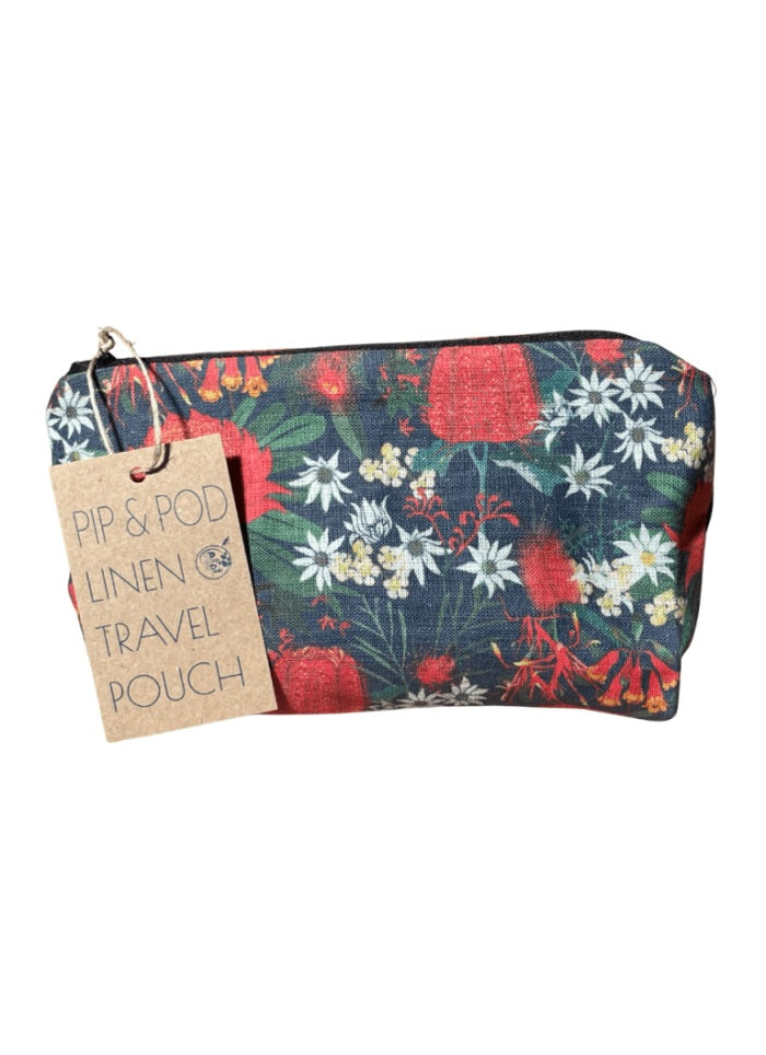 Floral patterned travel pouch with a tag on a white background