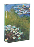A rectangular box featuring a Monet water lily painting on the front and spine, photographed on a plain white background.