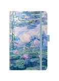 Notebook with a design inspired by Monet's 'Water Lilies' painting on a white background