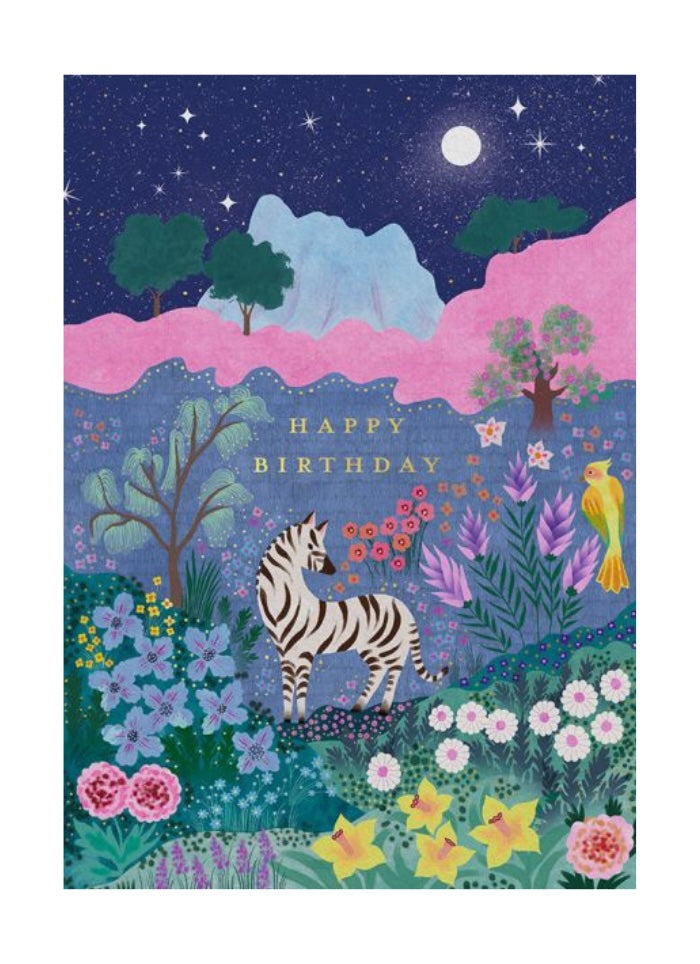 Birthday card with a zebra in a colorful landscape at night.