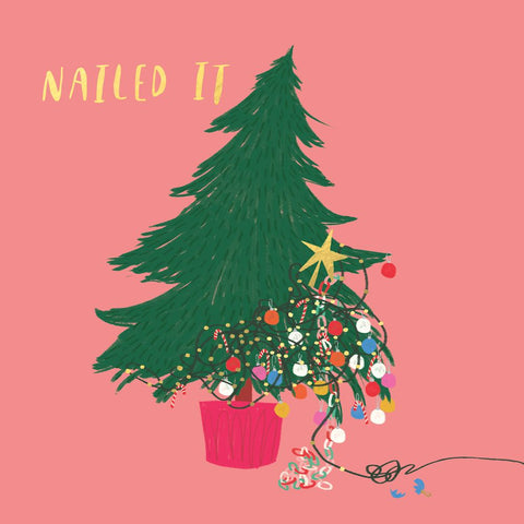 Illustration of a decorated Christmas tree with 'NAILED IT' text on a pink background
