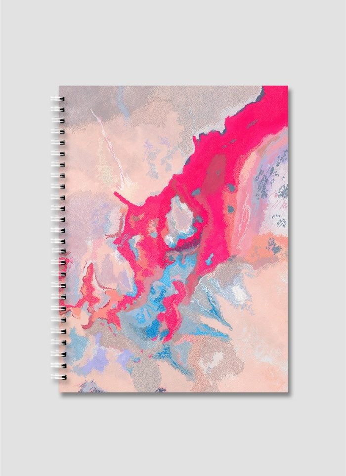 Notebook with a colorful abstract design on a light gray background