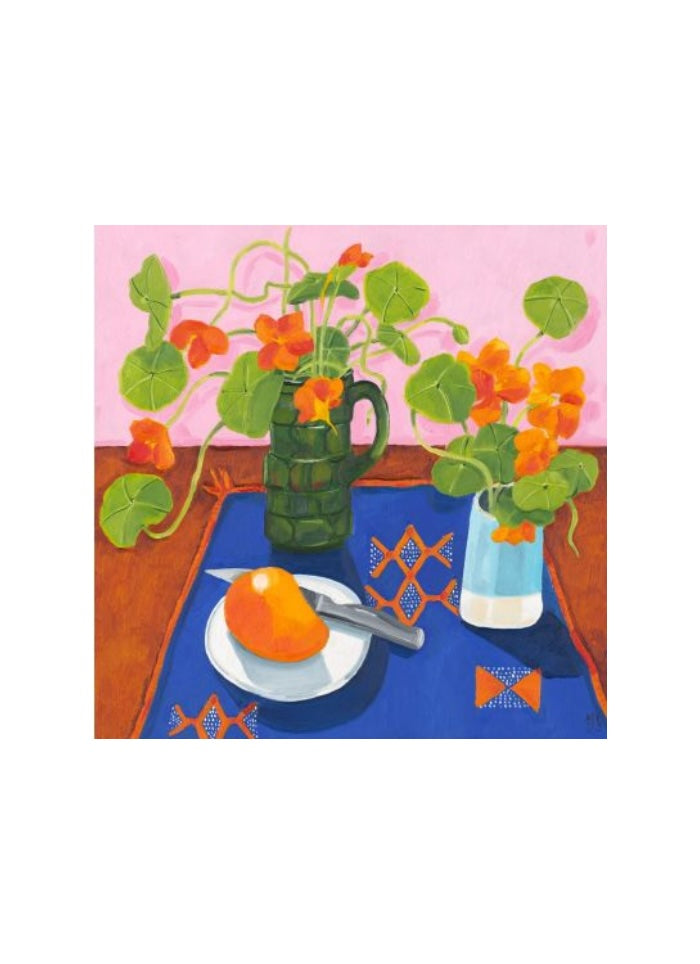 Still life with orange flowers in vases with a plate and mango on a table