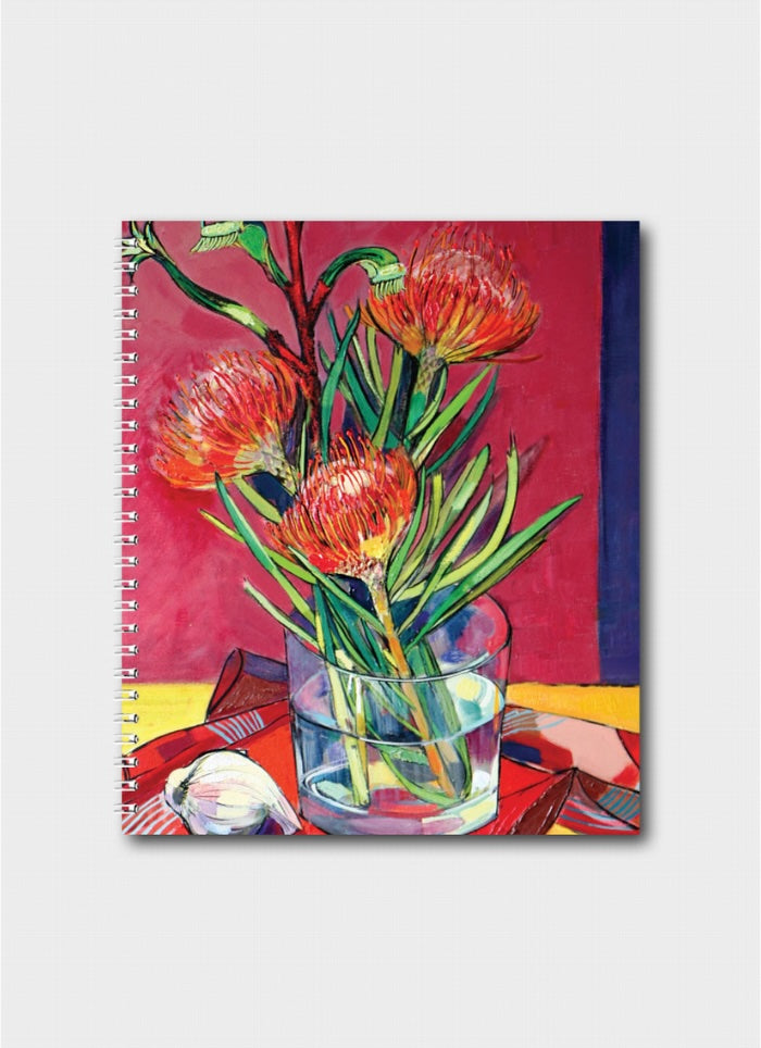 Notebook with a colorful design of flowers in a glass on a red background