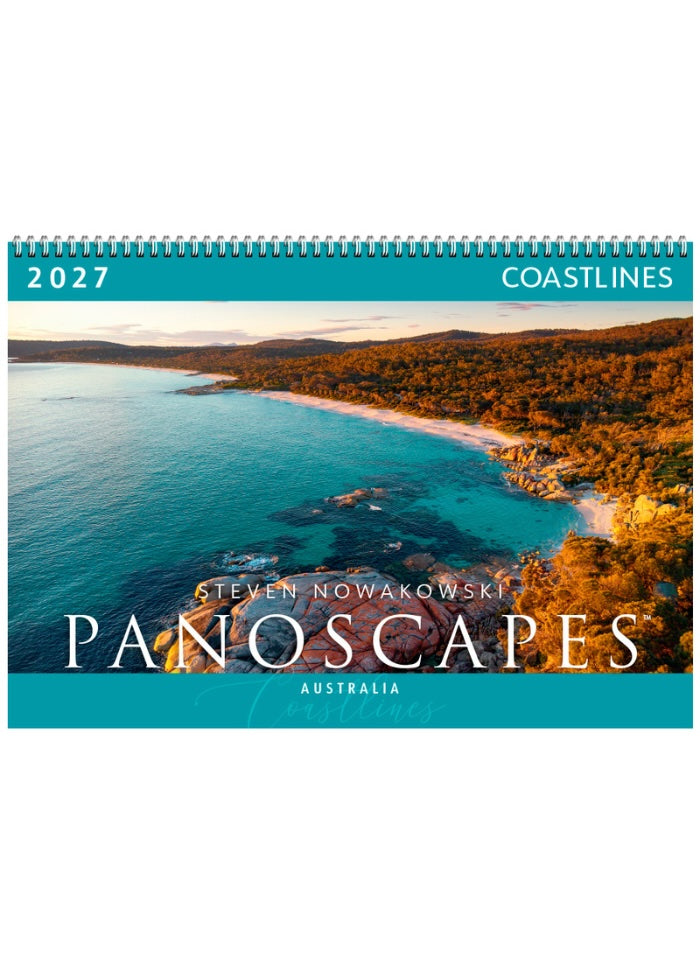 Front page of calendar with photo of a coastline with blue water and scrub.