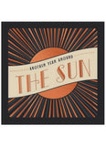 Decorative card with sun design and text 'Another Year Around The Sun' on a black background