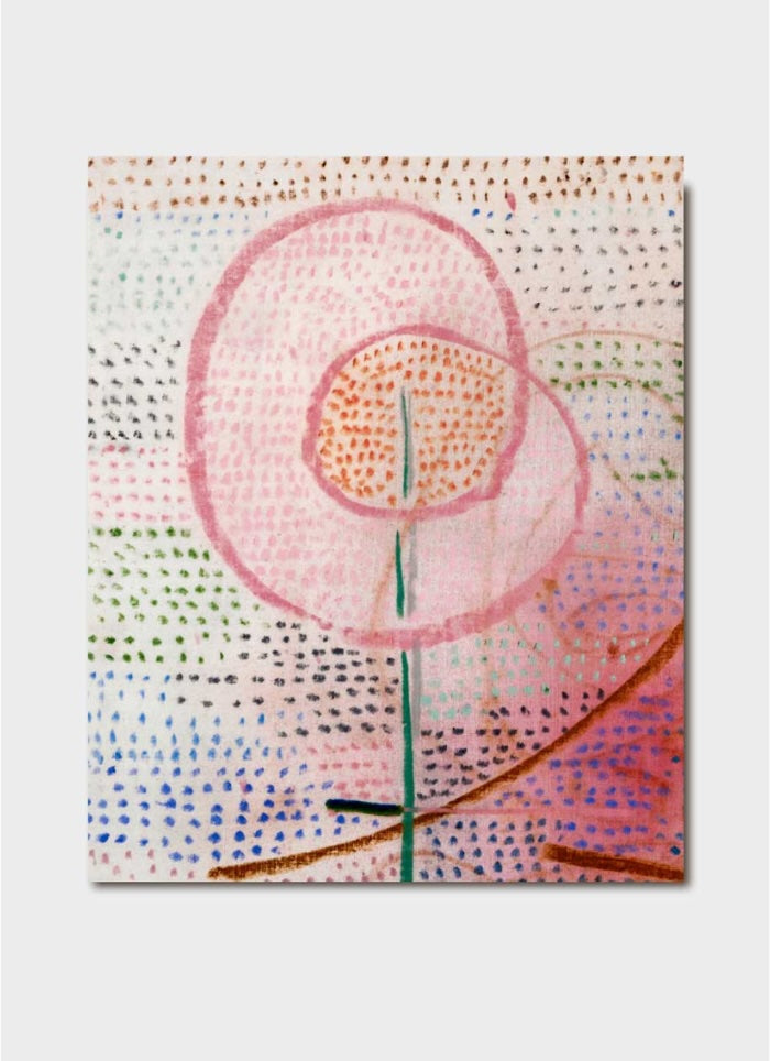 An abstract painting in pinks with dots in lots of colours loosely resembling a flower