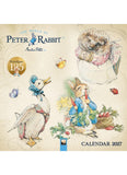 Calendar cover featuring illustrations of characters from 'The World of Peter Rabbit' with a decorative border.
