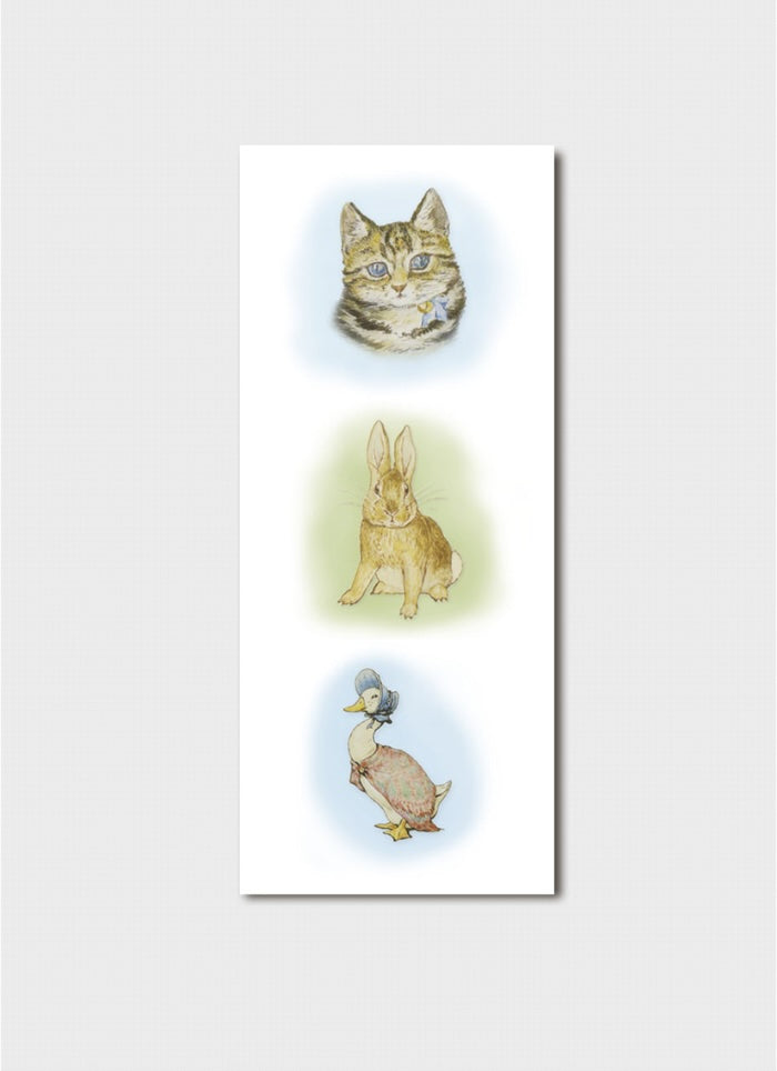 Framed artwork with illustrations of a cat, rabbit, and duck on a white background