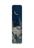 Bookmark with a design of a small animal in a natural setting on a dark blue background.