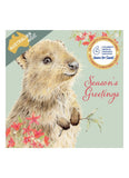 Christmas card with a beaver illustration and 'Season's Greetings' text on a light green background.