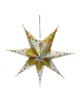 Green and gold paper star with glitter