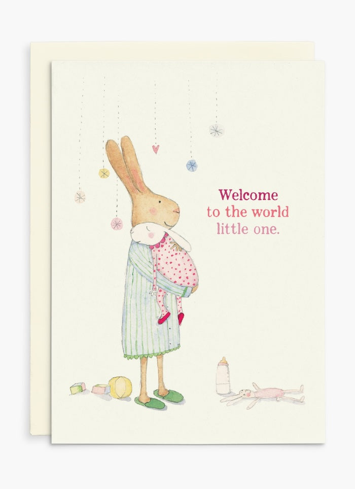 Greeting card with a rabbit illustration and text 'Welcome to the world little one' on a white background.