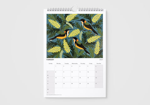 Calendar with bird and floral design on a white background