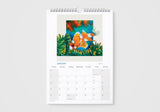 Calendar with a colorful illustration of a fish and coral on a white background