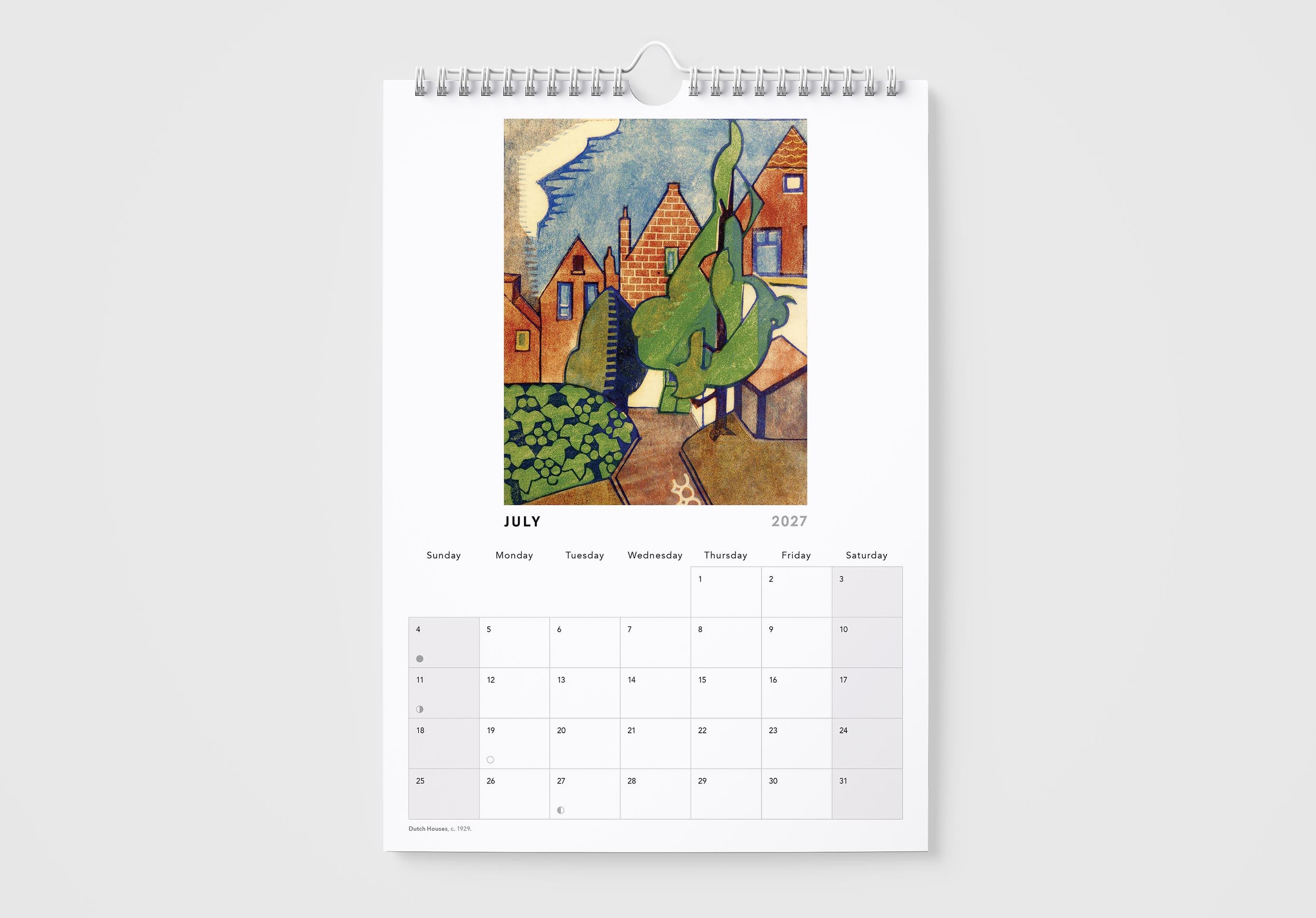 Calendar with a painting of houses and trees on a white background
