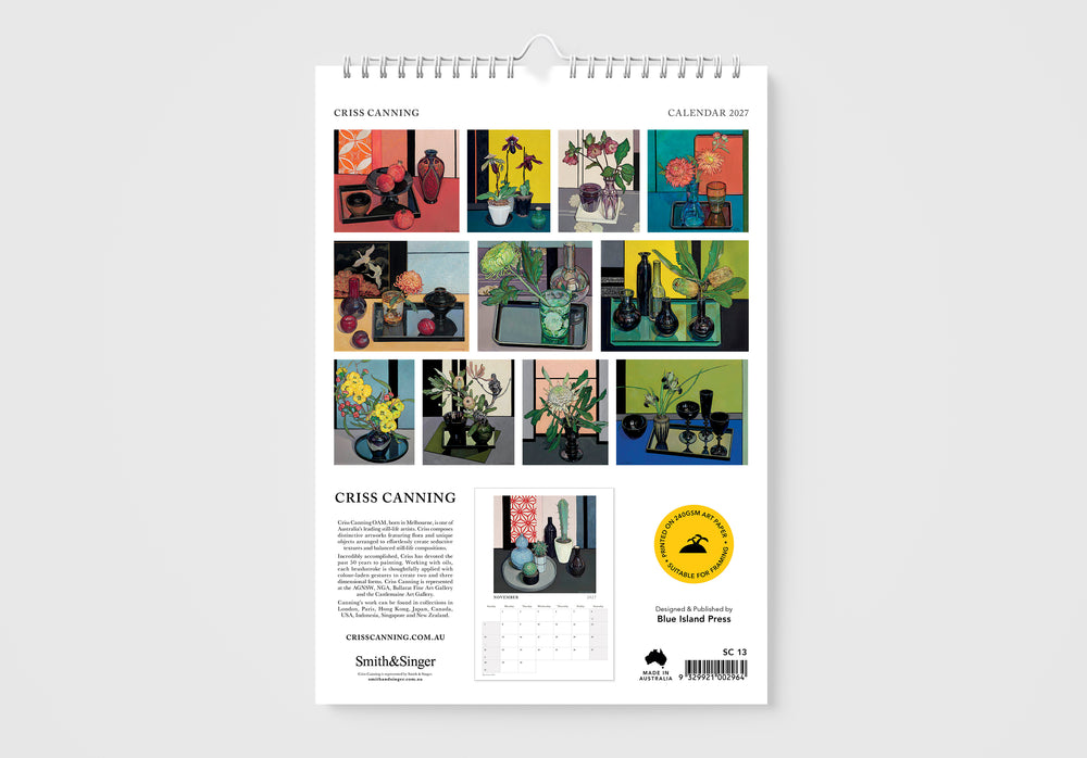 Calendar with artistic cover featuring small square illustrations on a white background
