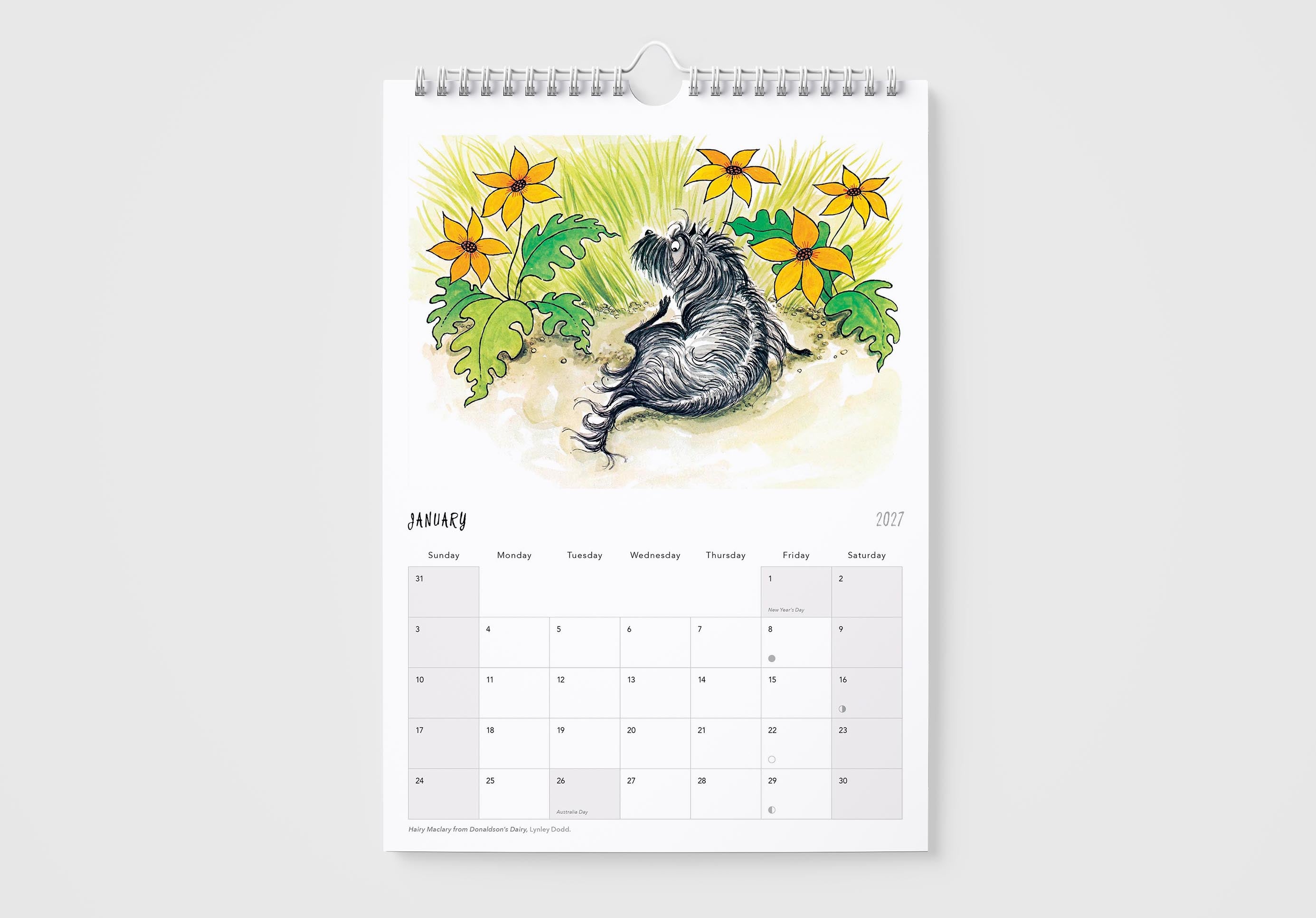 Calendar with a raccoon illustration and floral design on a white background