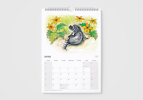 Calendar with a raccoon illustration and floral design on a white background