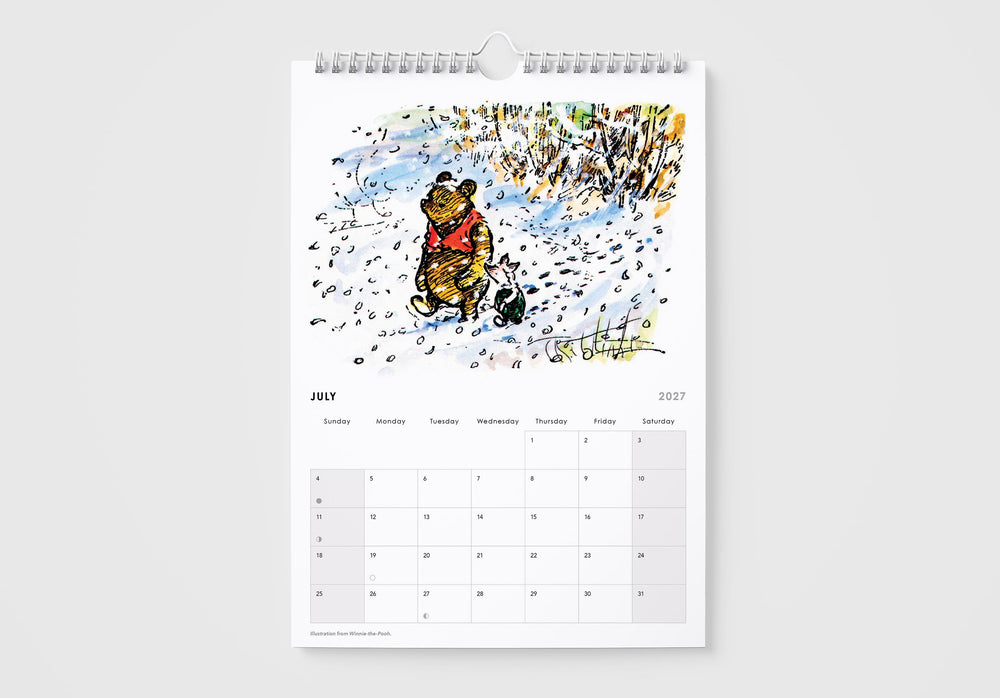 Calendar with a Winnie the Pooh illustration on a white background