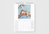 Calendar with a design of a fairy on a branch on a white background