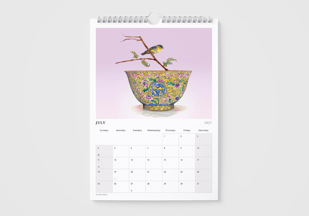 Calendar page for July with a decorative bowl and birds on a branch against a pink background